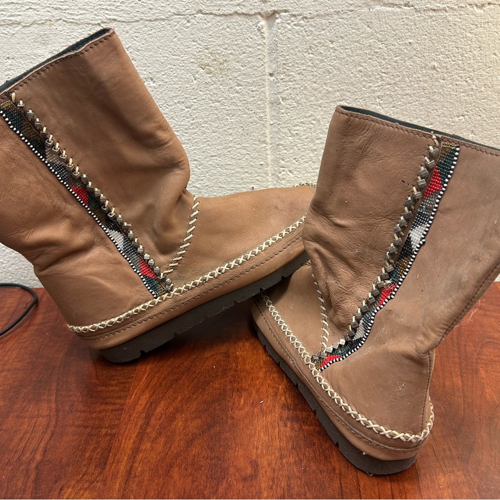 Woman’s beaded laid back London slip on boots